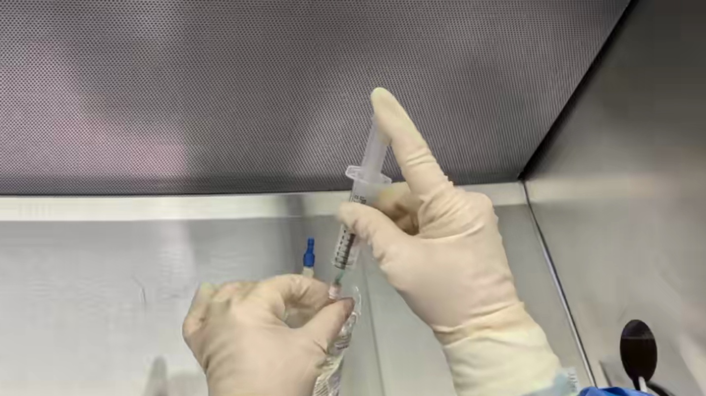 Center Drug-emptied syringe