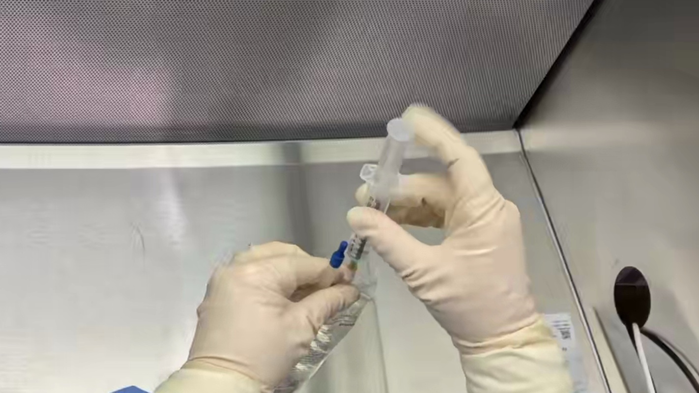 Center Drug-emptied syringe