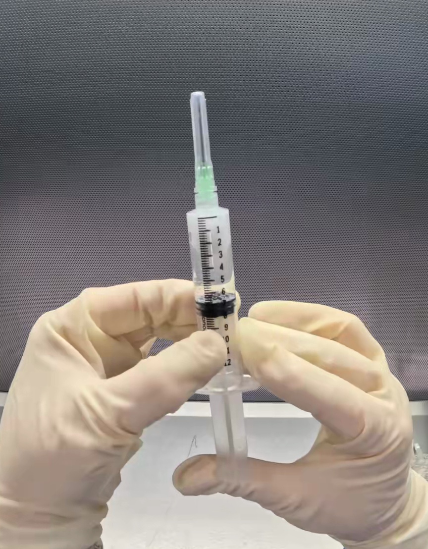 Center Drug-filled syringe