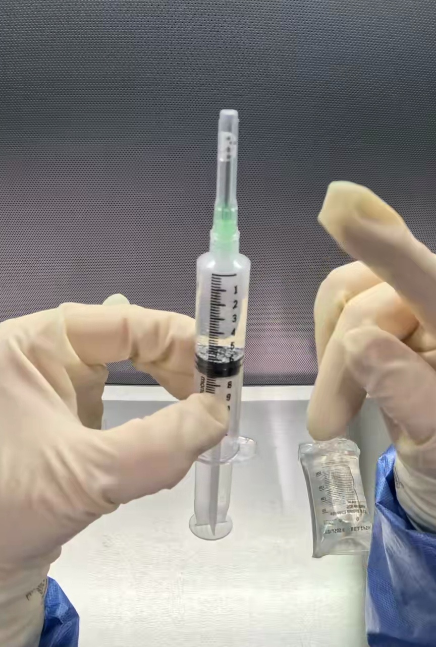 Center Drug-filled syringe