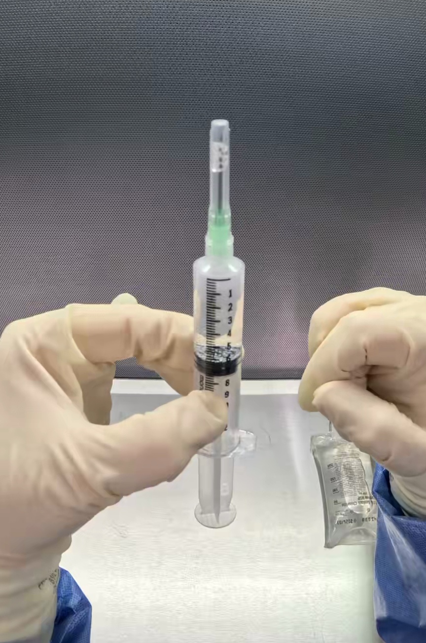 Center Drug-filled syringe