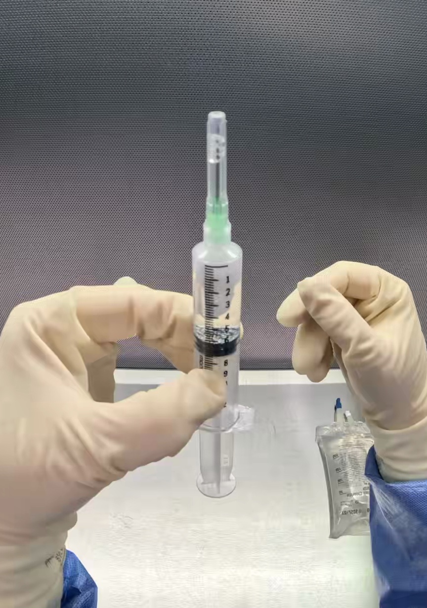 Center Drug-filled syringe