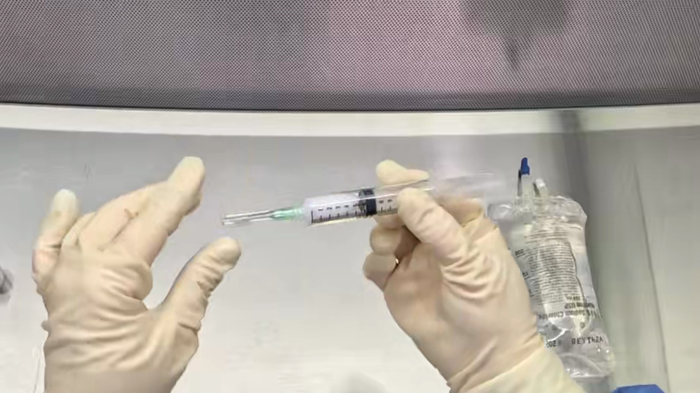 Center Drug-filled syringe